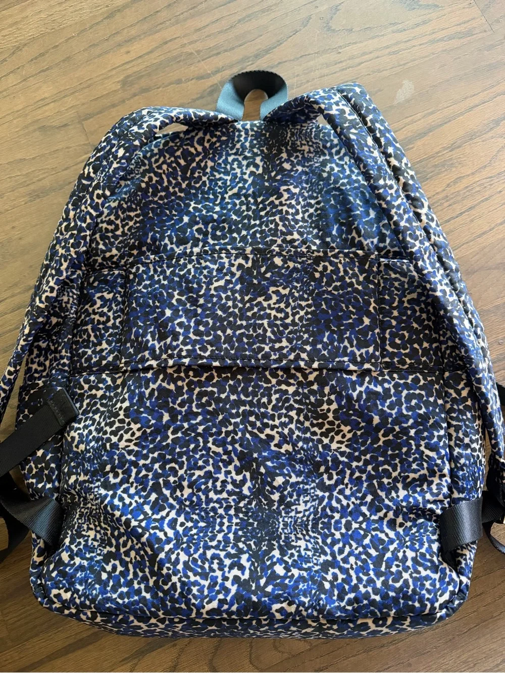 Kipling Navy and Black Leopard-Print Backpack with travel sleeve